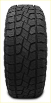 Black rubber monsta terrain gripper at tire with deep aggressive tread pattern size 285 60 r18