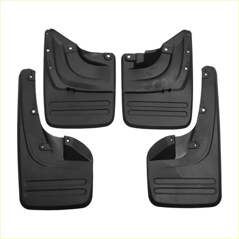 Set of four black plastic mud flaps with molded ridges and mounting holes for toyota fortuner 2010-2015