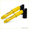 Bright yellow dobinsons twin shock absorbers with black caps for nissan pathfinder r51 diesel 25l tdi 2005 on