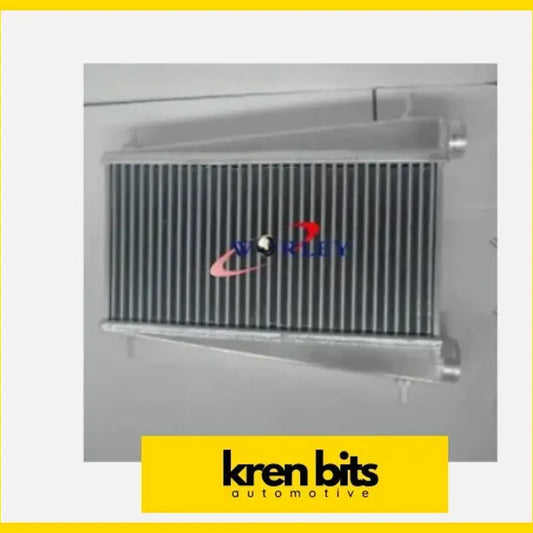 Silver aluminum automotive radiator with sleek ribbed design and polished fittings for nissan patrol safari gq td-42 intercooler