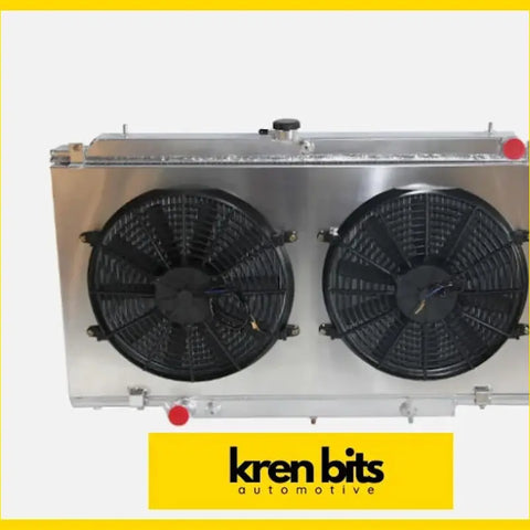 Silver aluminum radiator with two black cooling fans for nissan patrol safari wagon 1997-2003 fan shroud and radiator