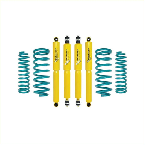 Set of four bright yellow dobinsons twin tube nitro shock absorbers with teal coils for nissan patrol y60 gq wagon