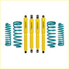 Set of four bright yellow Dobinsons twin tube Nitro shock absorbers with teal springs for Nissan Patrol Y60 GQ Wagon