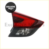 Red and clear plastic nissan x-trail t32 tail light assembly 2017-2019 with sleek angular design back side view