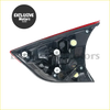 Black plastic nissan x-trail t32 tail light assembly 2017-2019 with red trim and internal led components side view