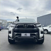 White toyota hilux pickup truck with black lower style nudge bar compatible with front camera and sensors