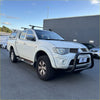 White mitsubishi triton pickup with matte black nudge bar compatible with front sensors 2005-2015 model