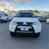 White mitsubishi triton with matte black nudge bar compatible with front sensors and roof rack from 2005-2015 models