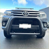 Black metal nudge bar with compatible front sensors mounted on gray toyota hilux 2015-2025 matte finish