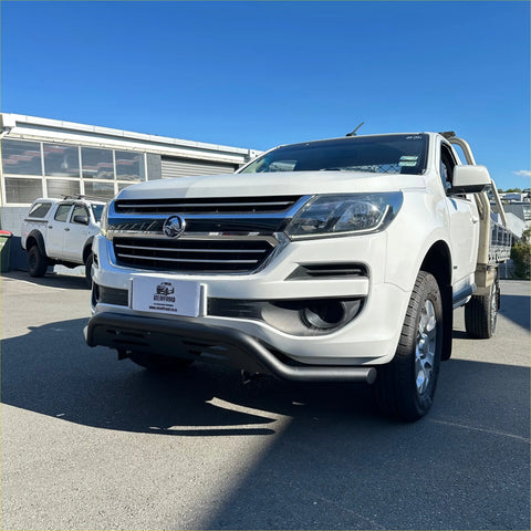 White holden colorado with black nudge bar and chrome grille showing front bumper for 2012-2020 models