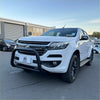 White holden colorado pickup truck with matte black nudge bar and black protective front bumper guard and alloy wheels