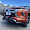 Orange mitsubishi triton pickup with black nudge bar lower style bumper guard and chrome accents 2019-2023