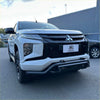 White mitsubishi triton pickup truck with black lower style nudge bar and rugged front bumper 2019-2023 model