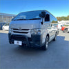 Silver Toyota Hiace van with matte black nudge bar and black front bumper guard for narrow body 2005-2019 model