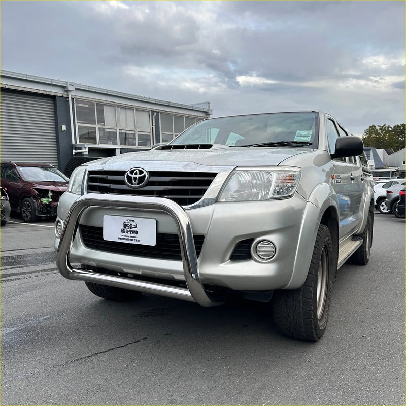Silver toyota hilux pickup truck with chrome nudge bar and side steps for hilux vigo 2005-2015 use