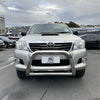 Silver toyota hilux with chrome nudge bar and black grille for 2005-2015 vigo model pickup truck