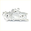 Silver metallic oil cooler cover with machined surfaces and bolt holes for nissan datsun d21 king cab 2.3l back side