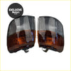 A pair of black-framed park lights for mitsubishi pajero v31 v32 v33 with clear and amber two-tone corner indicators