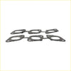 Black rubber gasket set with circular cutouts and mounting holes for permaseal exhaust manifold kit for nissan