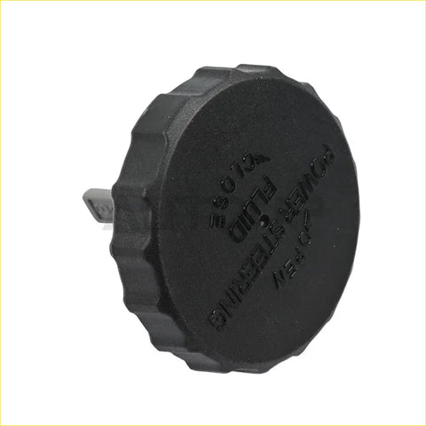 Black plastic power steering reservoir cap with embossed text and ribbed edge for toyota tacoma 4runner land cruiser