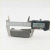 Gray plastic camera grip measured by digital caliper for quarter glass lock latch on mazda b2000 b2200 b2600 bravo