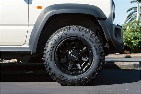 Black radar renegade 265 75r16 off-road tire mounted on black alloy wheel with orbe logo at center