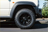 Black radar renegade rt plus off-road tire 285 65 r18 on black alloy wheel with orbe logo at center