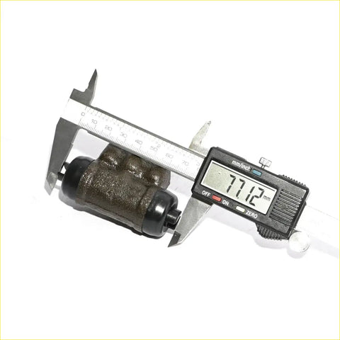 Rear brake cylinder for mitsubishi minicab town box wide 1999-2009 black metallic with textured surface measured 71.12 mm