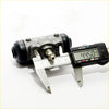 Rear brake cylinder for toyota hilux 2wd 1988-1997 black rubber-coated metal with brass fitting measured at 44.50 mm