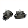 Pair of dark gray cast iron rear brake cylinders with black rubber seals and silver fittings for mitsubishi minicab