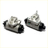 Silver metallic rear brake cylinders with black rubber caps and threaded fittings for nissan crew sedan 1993-2002