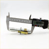 Silver and brass rear drum brake shoes adjuster set for Toyota Hilux RN20 RN25 being measured by a digital caliper