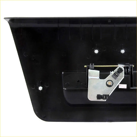 Back view of black plastic rear gate handle with silver metal latch for nissan navara ute d40 2004-2014