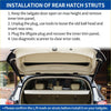 Beige rear lh rh tailgate power lift support struts with black mounting hardware installed on a toyota fortuner tailgate