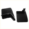 Black plastic rear mud flaps with molded contours and mounting holes for nissan navara d22 1997-2004 shown from back side