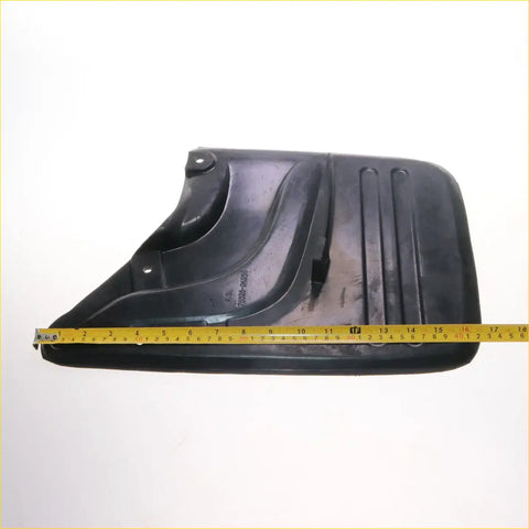 Black rubber rear mudguard with molded ridges and mounting holes for toyota hilux 2004-2010 shown from back side