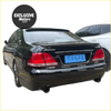 Back view of a black glossy toyota athlete sedan featuring a sleek chrome rear roof spoiler for toyota crown