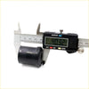 Black cylindrical rubber rear spring bush for datsun nissan ute 620 being measured with digital caliper