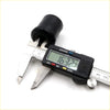 Black rubber rear spring bushing being measured by digital caliper for datsun nissan 620 1972-1979