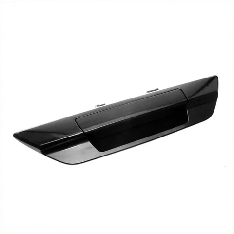 Black glossy plastic rear tailgate handle for Toyota Hilux Revo 2015-2020 with a sleek modern design back side view