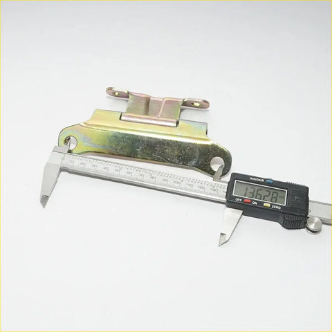 Rear tail gate hinge for toyota hilux 2005-2015 with yellowish green patina metal and central pivot shown from back side