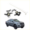 Gray nissan navara pickup with black wheels and side steps showing rear tail gate lock set for d23 np300 2014-2021