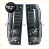 Rear tail light for toyota prado with black smoked led design and clear lens housing showing back side view