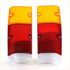 Pair of vintage-style red and amber rear tail light lens assemblies with clear plastic mounts for nissan datsun 720