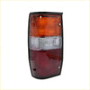Black-framed rectangular rear tail light with amber clear and red lens sections for mitsubishi triton cyclone colt l200