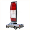 Rear tail light lhs red and clear plastic with black trim for silver nissan datsun d22 navara 1997-2004 back side view