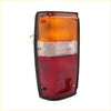 Rear tail light lhs for toyota hilux 1984-1988 showing black-framed amber clear and red lens sections backside