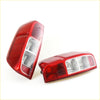 Rear tail light x2 for nissan navara d40 2005-2012 showing red plastic curved design with clear lens sections backside