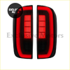 Back side of black led rear tail lights for nissan navara np300 with vibrant red vertical rectangular light bars