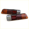 Pair of vintage-style rectangular rear tail lights with amber and red lenses in black plastic housing for datsun 610 620 ute